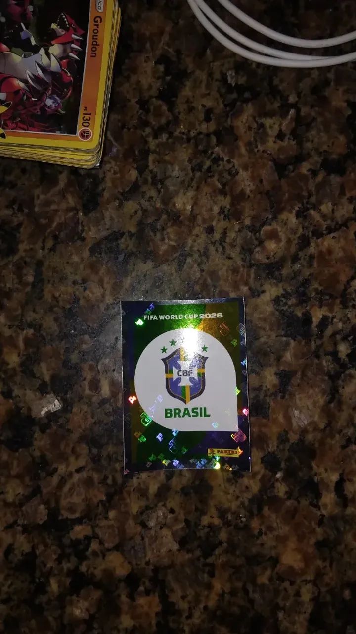 Figurinha original Copa 2026 símbolo do Brasil