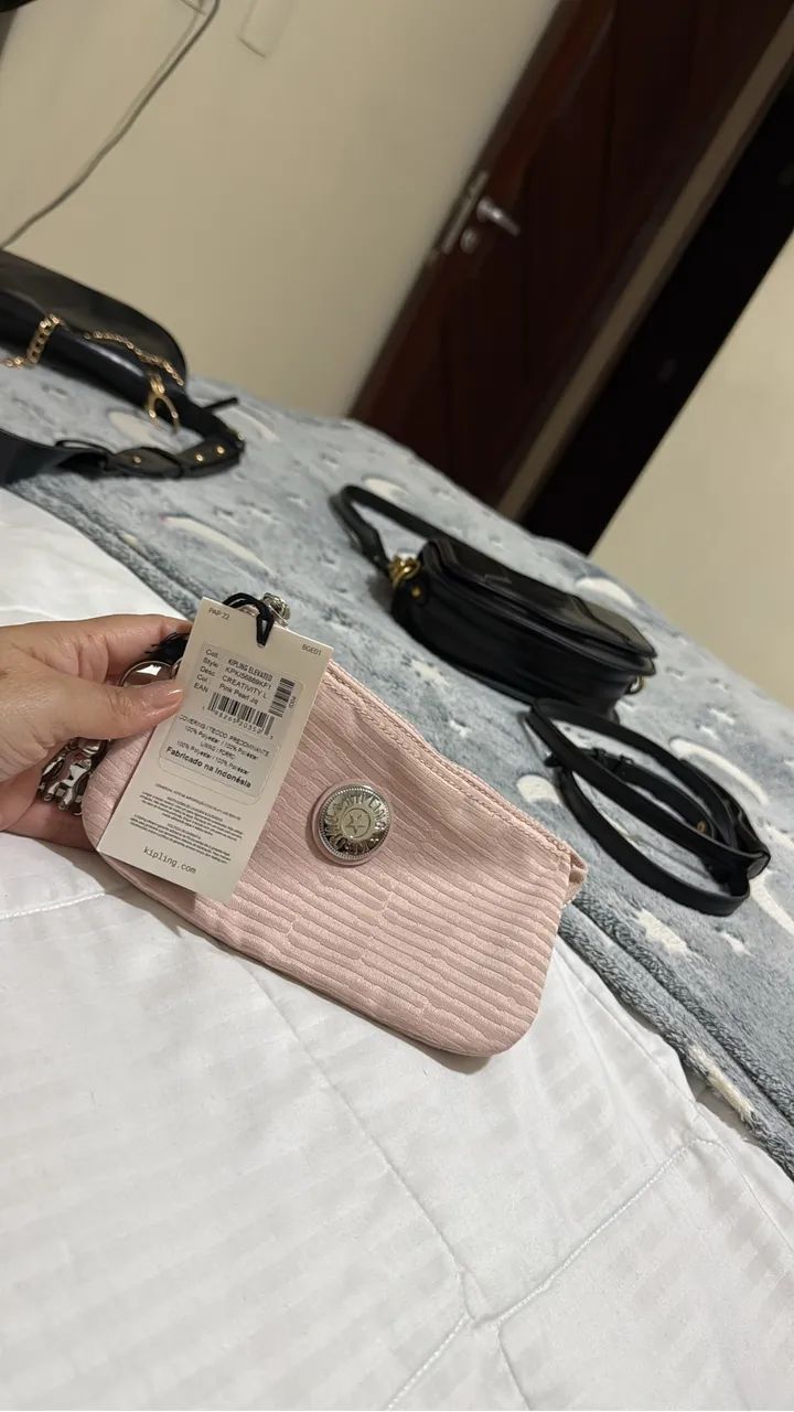 Bolsa de mão/ carteira da Kipling  - Foto 4
