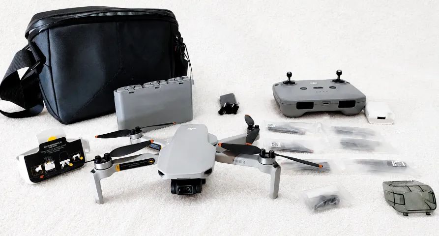 Drone DJI Mini 2 Fly More Combo + Cartão 128GB + Acessórios - Foto 3
