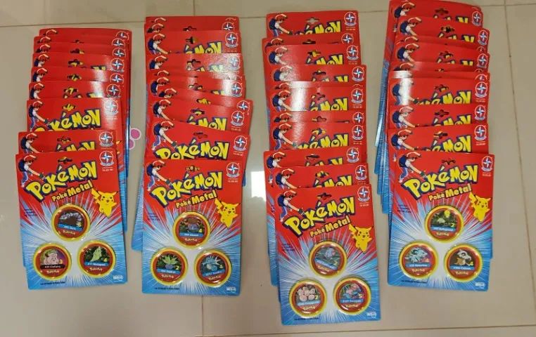 Lote com 41 cartelas lacradas PokéMetal Estrela