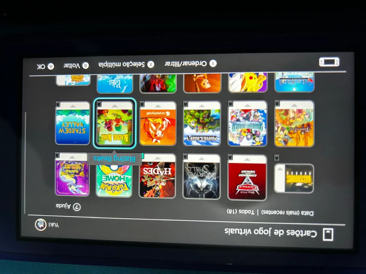 Nintendo Switch lite + jogos 64315487903747122