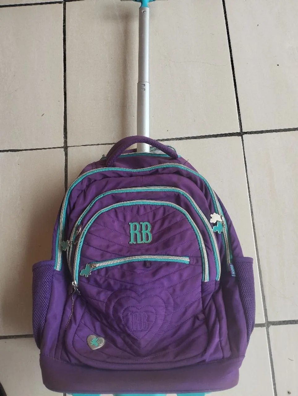 Mochila de Rodinhas Roxa Rebecca bonbon