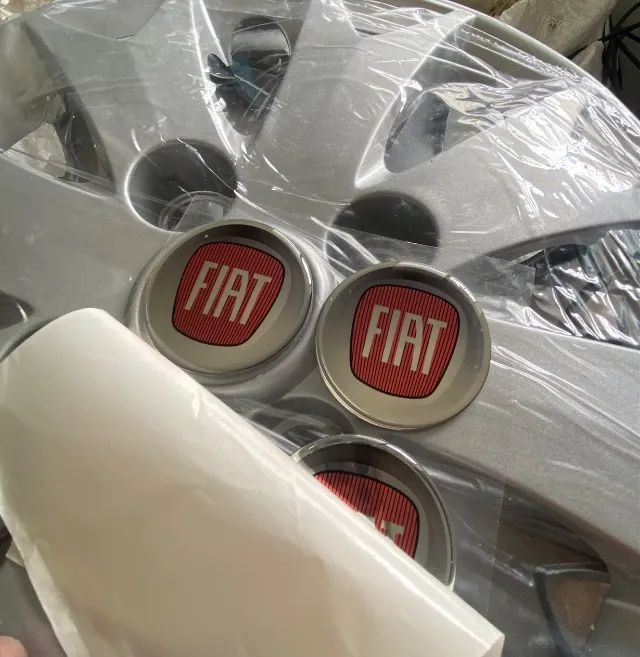 4 Calota Palio Fire Economy Flex Aro 13 Prata Com Emblema - Foto 4