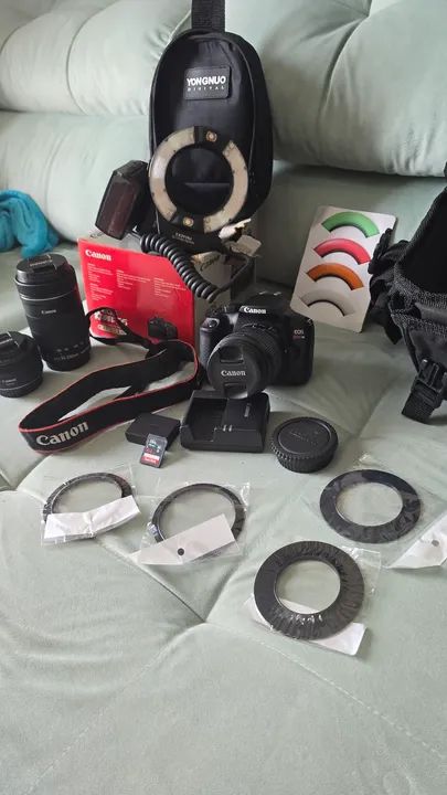 Câmera Canon rebel T6 - lente Canon 50mm - lente Canon 55 250 - flash circular