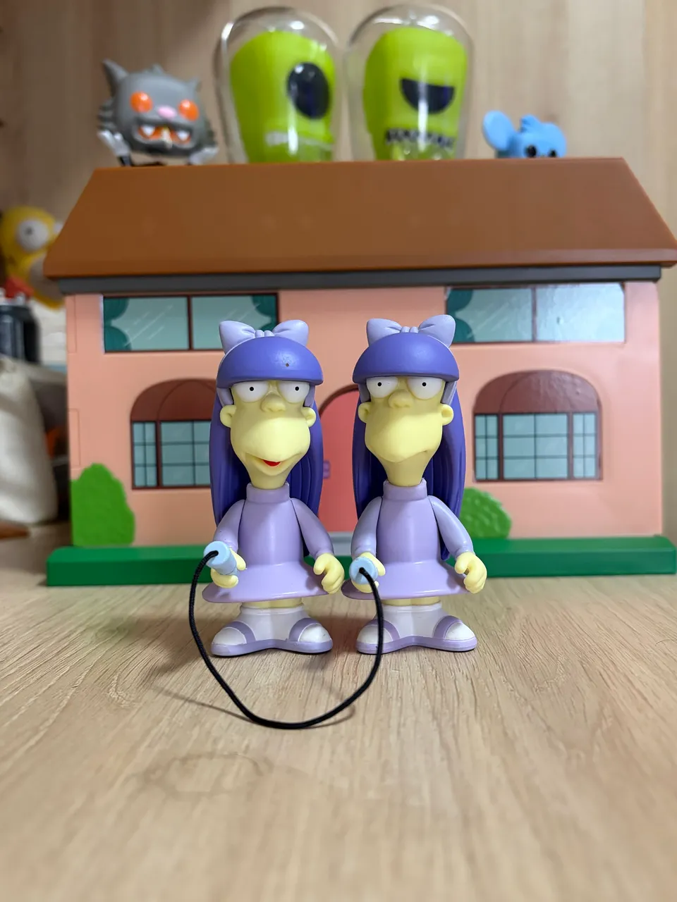 Action figure Simpsons playmates homem radioativo e Milhouse como