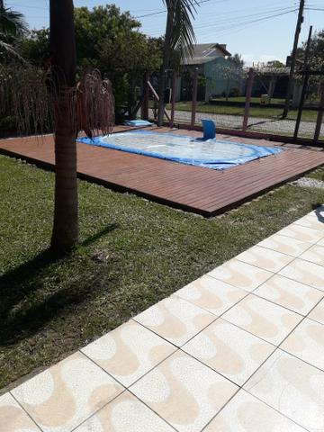 Casa com piscina em Capão