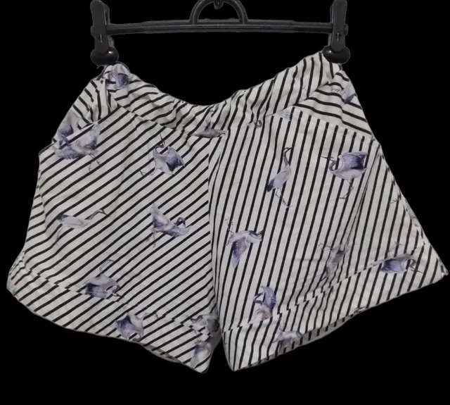 Short bermuda pássaros