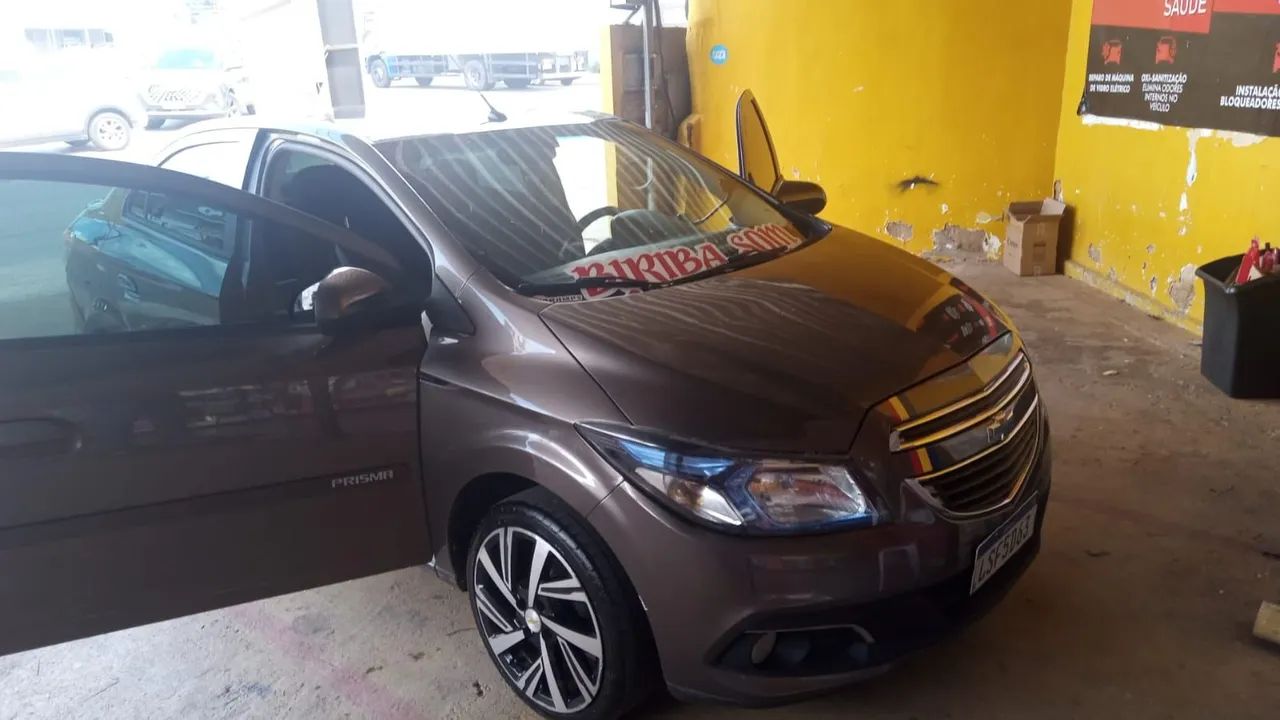 Prisma 2013/14 1.4 LTZ cinza metálico completo faço 37.000 à vista leia o anúncio