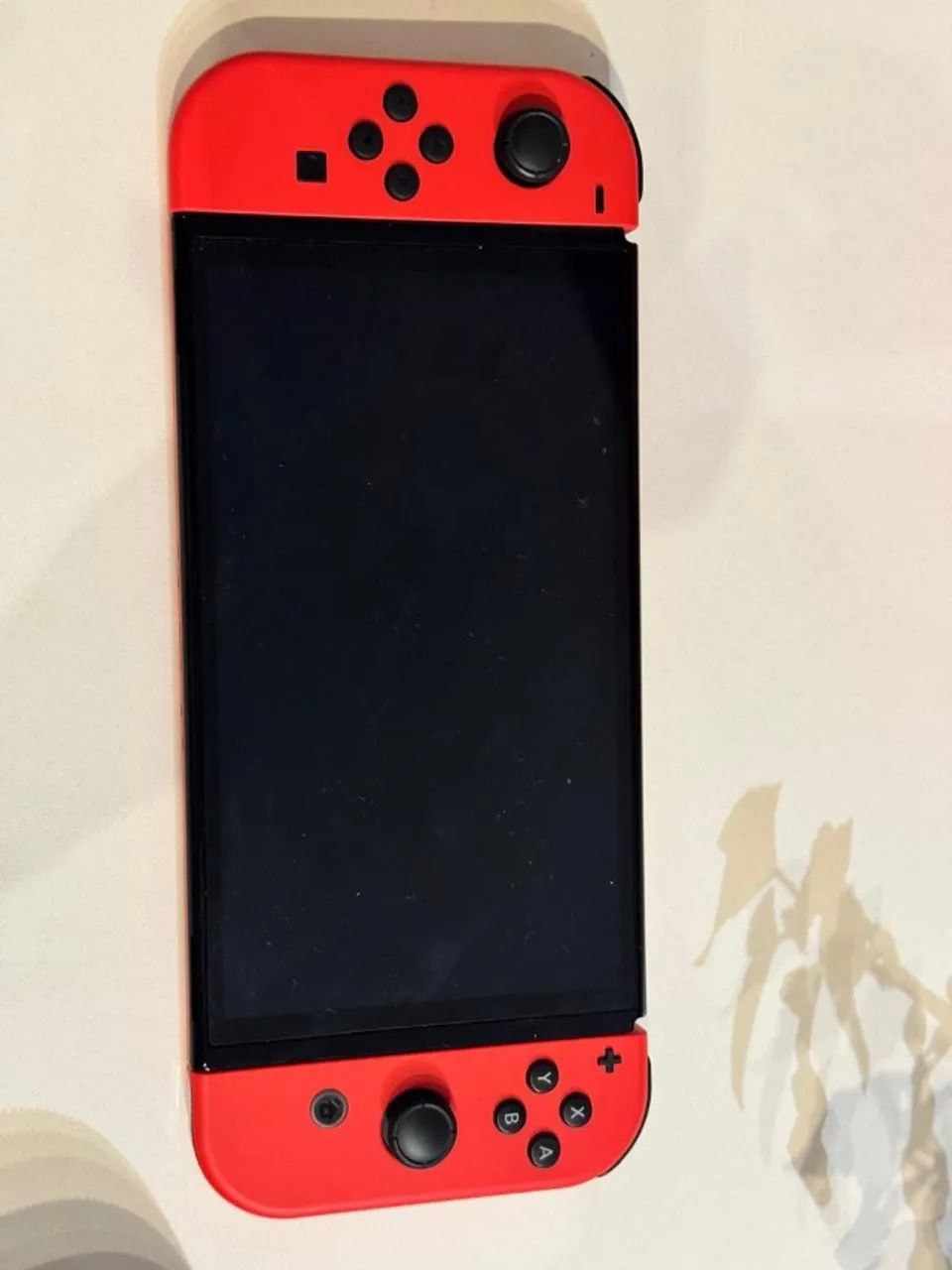 Nintendo Switch OLED  DESBLOQUEADO Vermelho/Azul + Estojo + Suporte + Carregador + Grips  - Foto 4