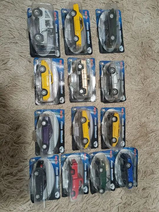 Lote com 13 carrinhos da coleção Free Wheels Maistro jornal extra - Foto 5