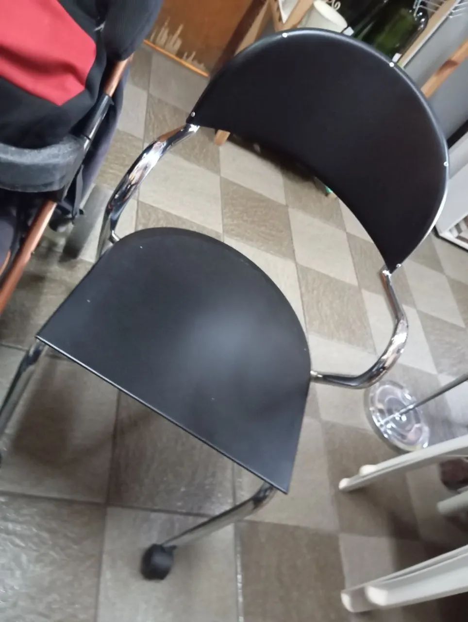 Cadeira auxiliar de apoio.