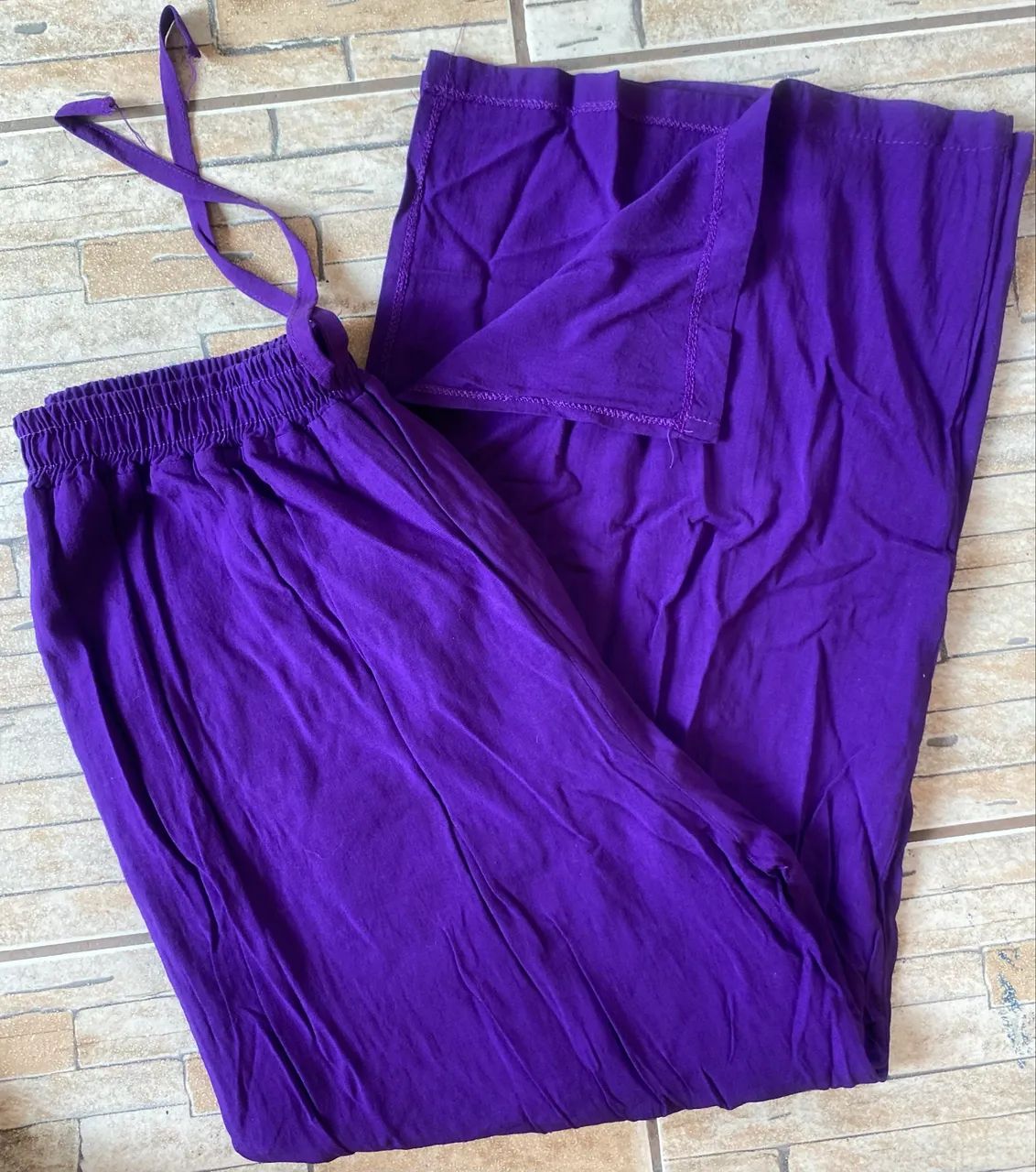 Calça com fenda linda - TAM G