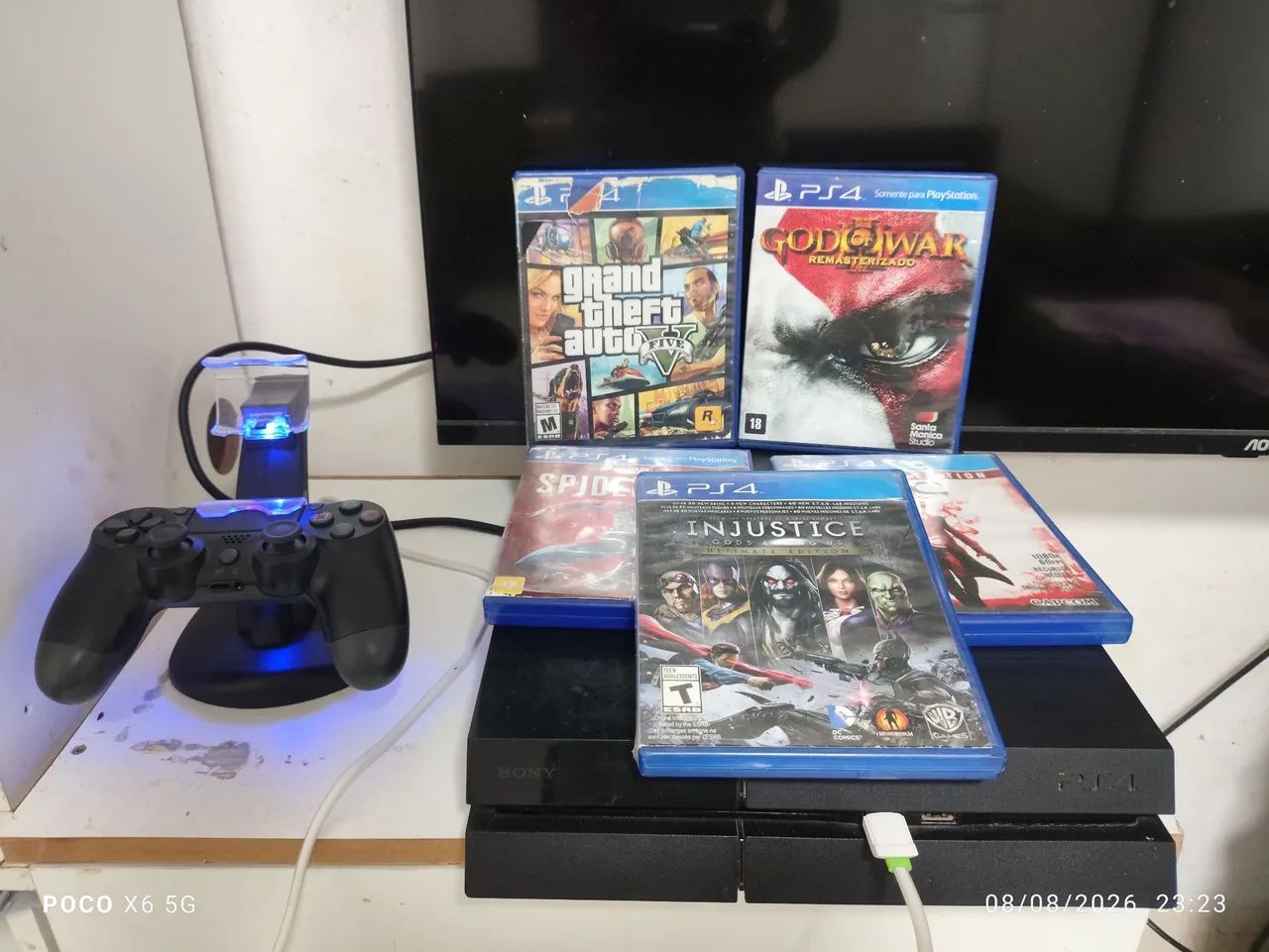 Ps4 1tb com cinco jogos e base de carregamento 