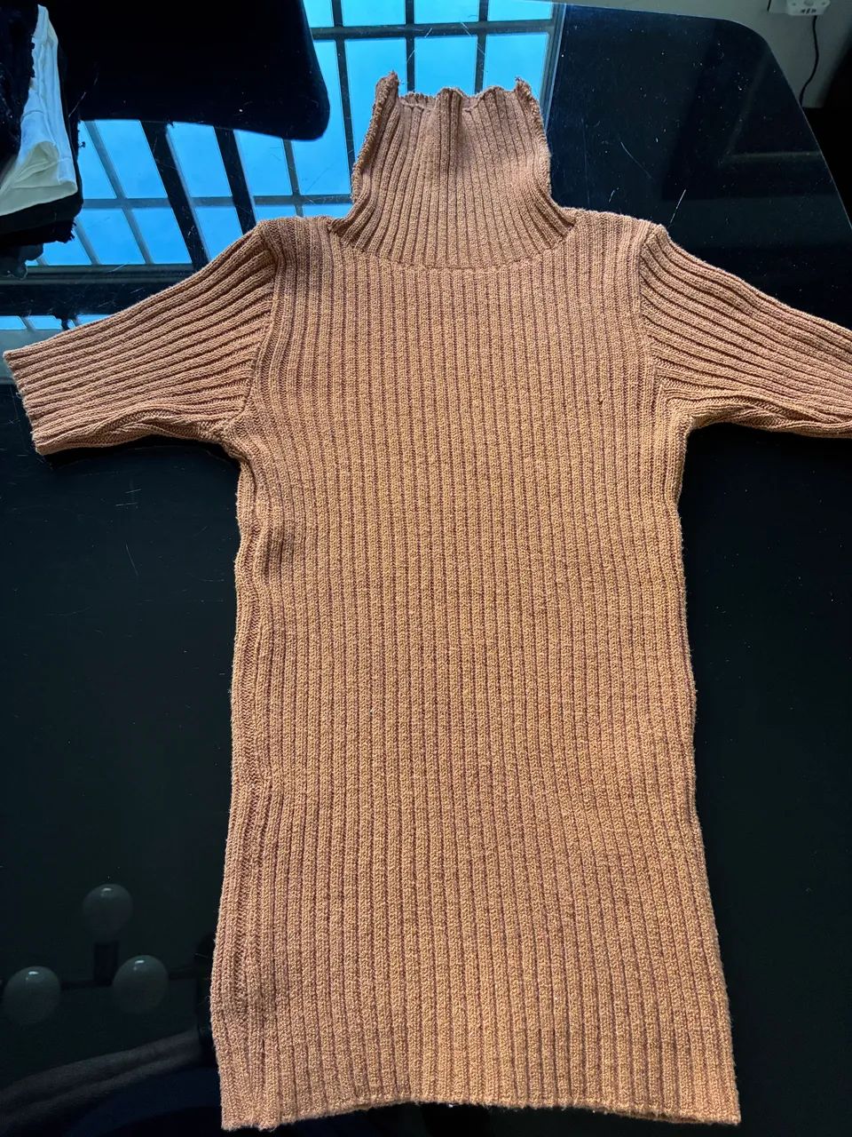 Blusa de tricô gola alta