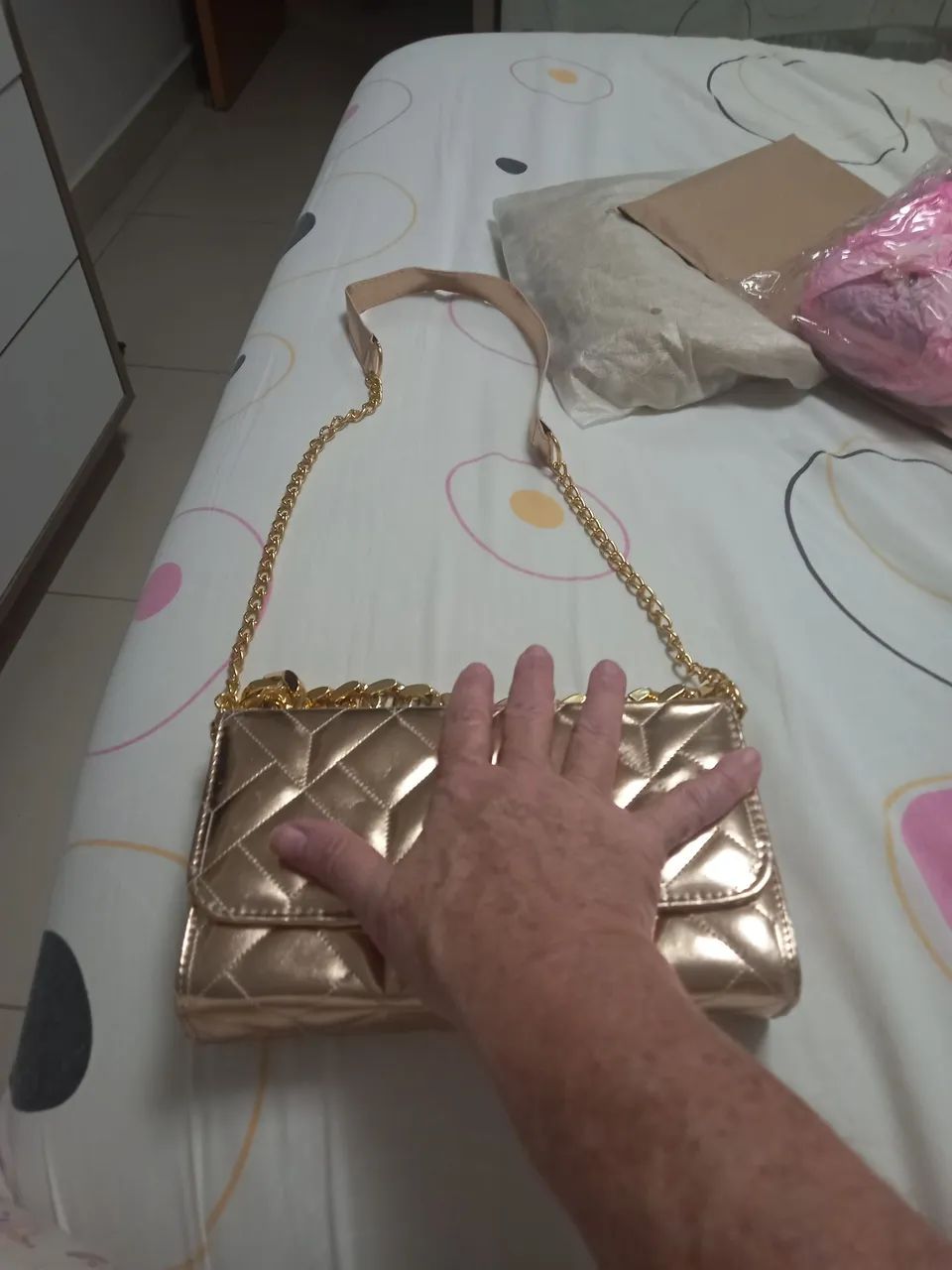 Linda Bolsa dourada.