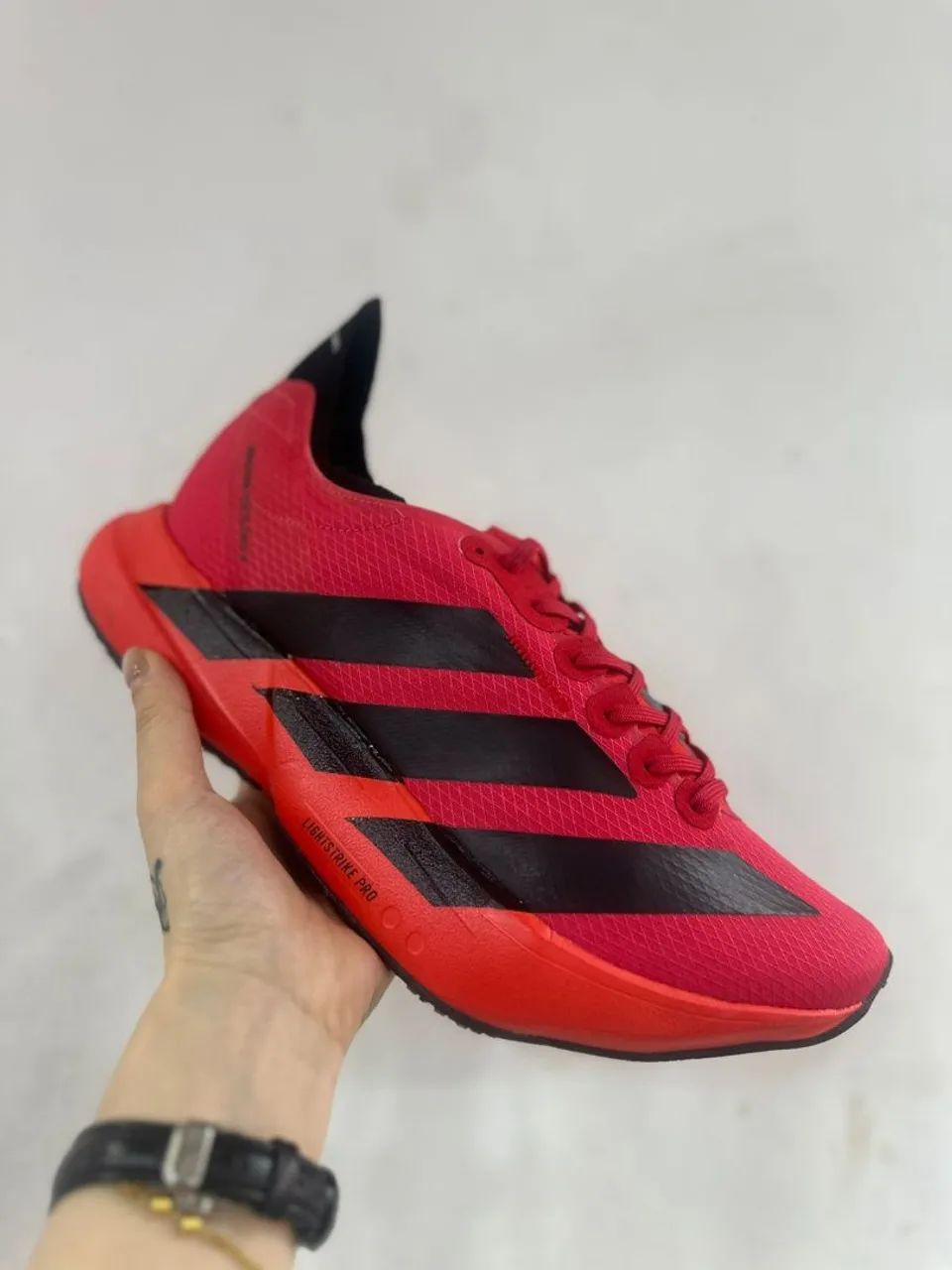 Adidas ADIZERO lightstrike veja o catálogo 