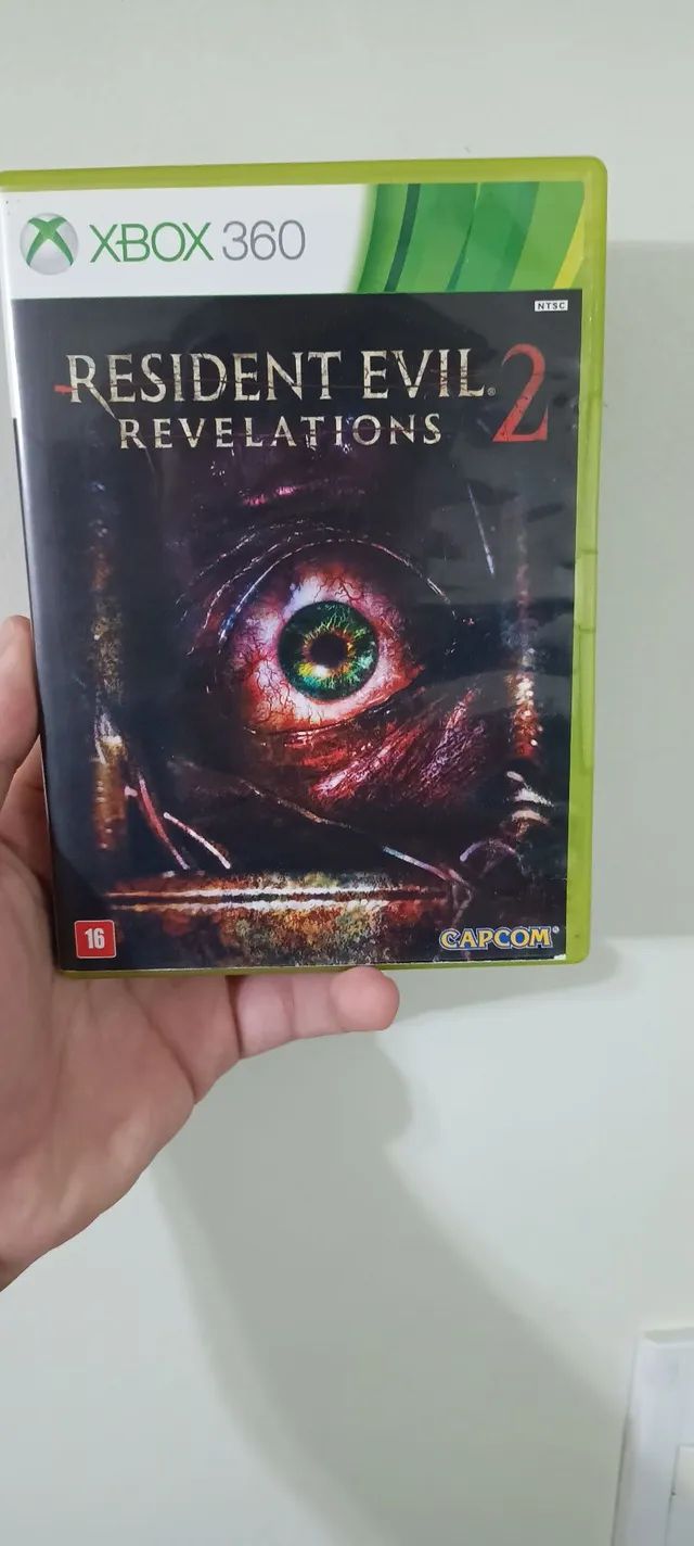 Jeu Resident Evil Revelations Pour Xbox 360 - Version PAL FR, Neuf Sous Blister (emballage Légèrement Abîmé)