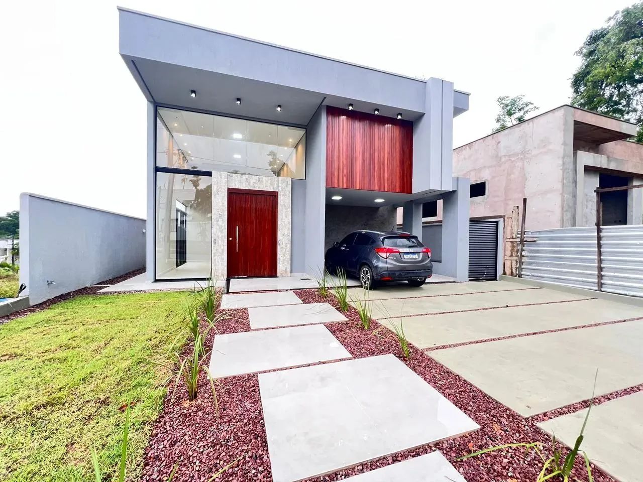 Casa no Alphaville 4/ 4 Suítes uma com Closet Área gourmet e deck com Piscina e Cascata