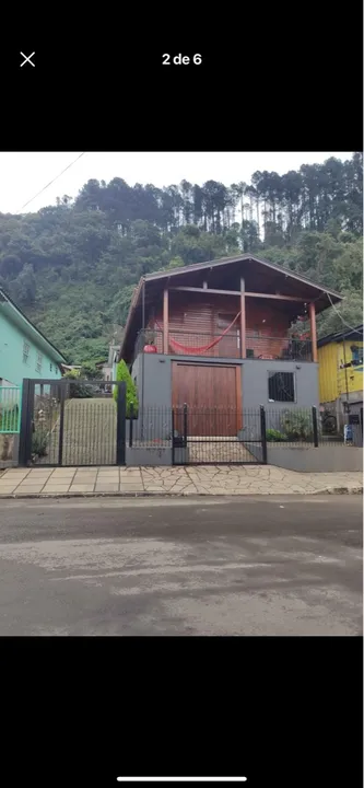Casa com terreno cercado