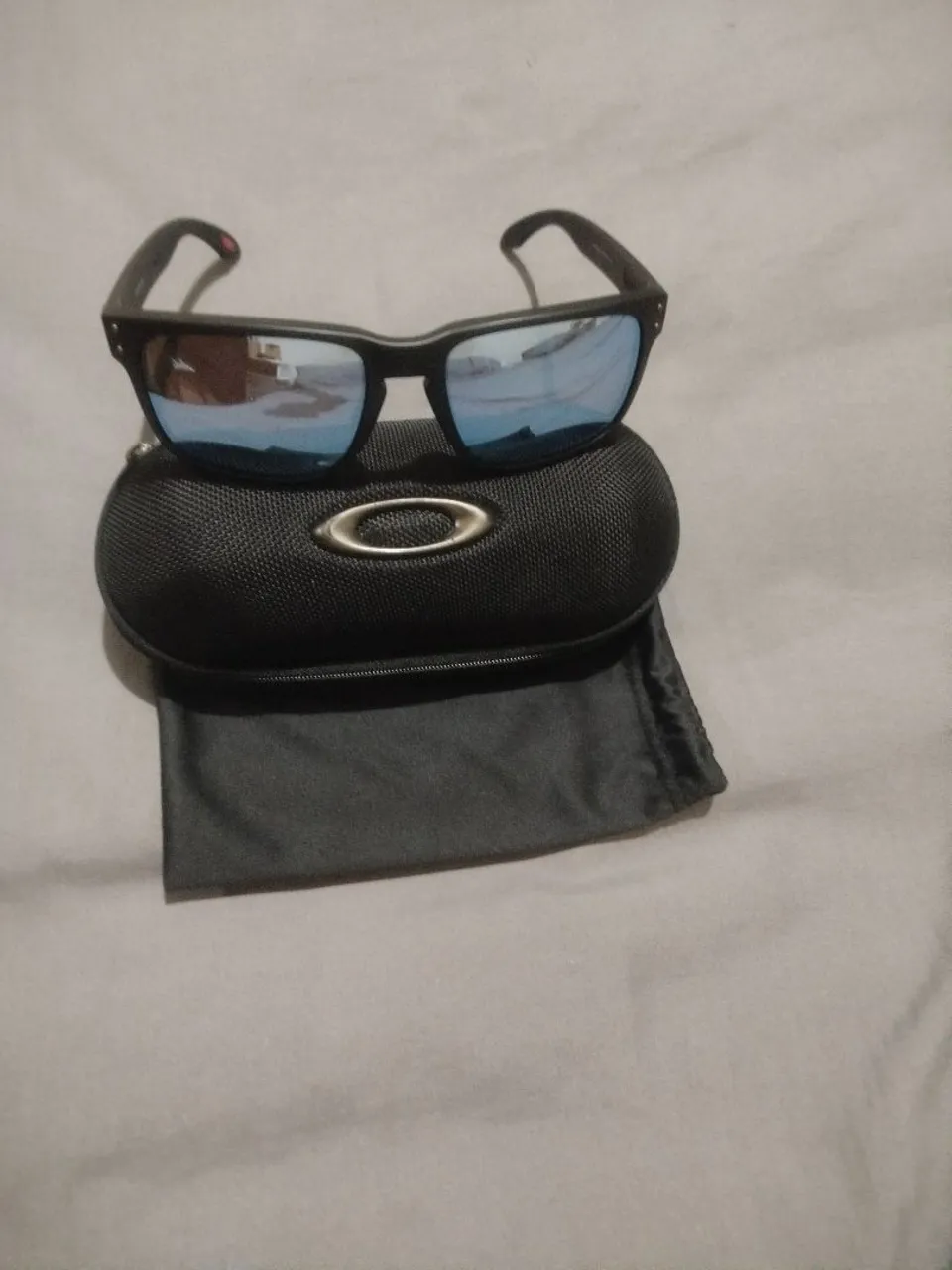 Óculos de Sol Oakley - Lentes Azuladas original
