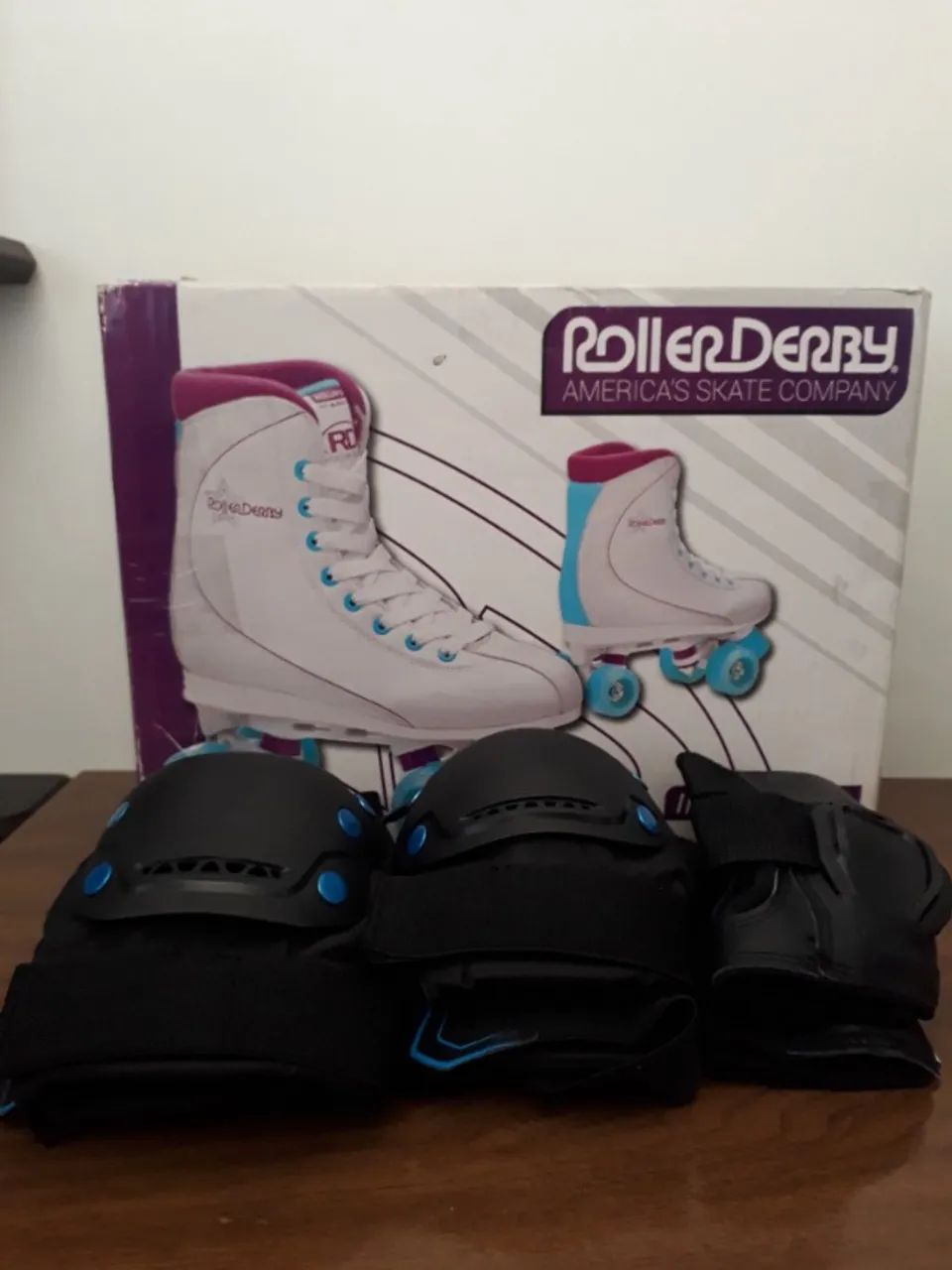 Itens seminovos (Patins e kit acessórios)