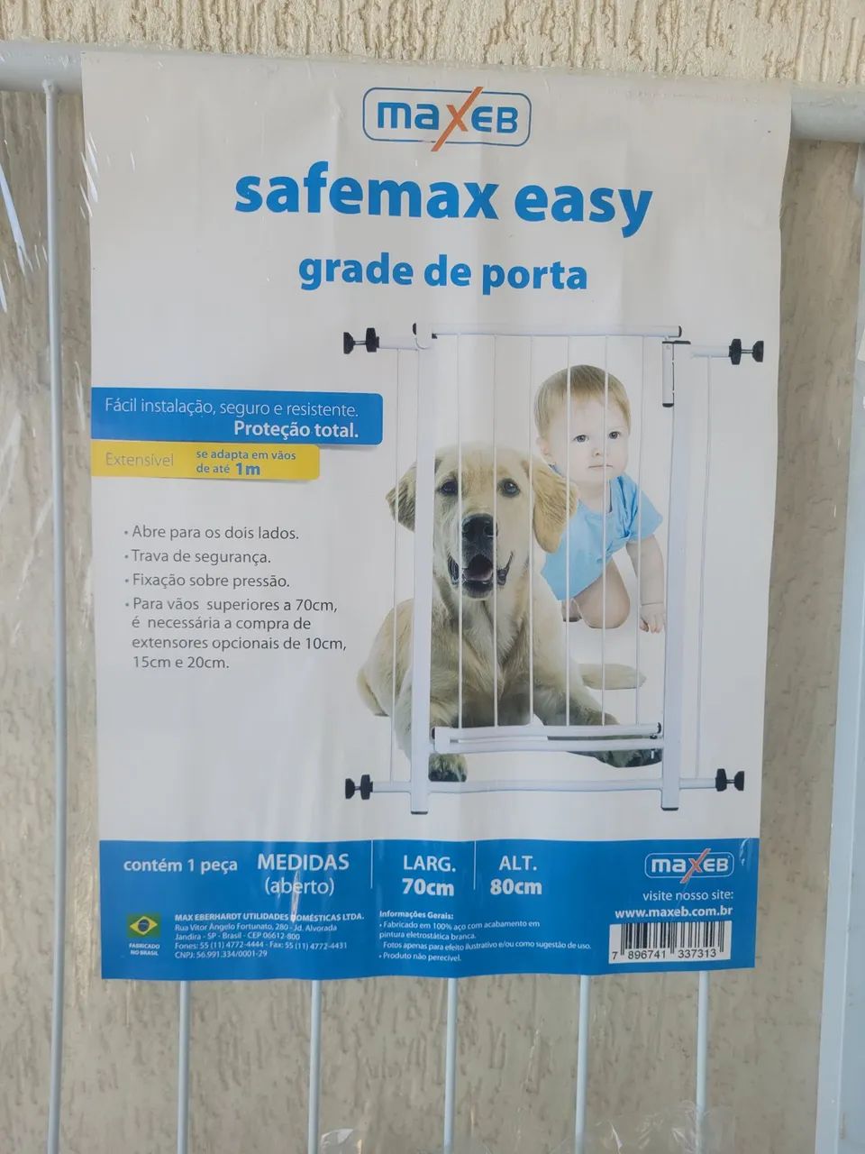 Grade para proteção de crianças e pets, nova, nunca usada, na embalagem. Fácil e prática