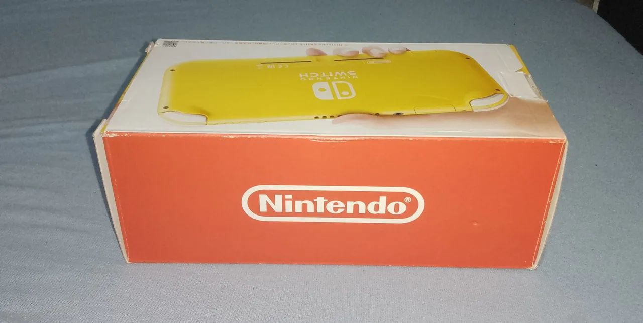 Nintendo Switch Lite Amarelo - Caixa vazia, berço, manual +