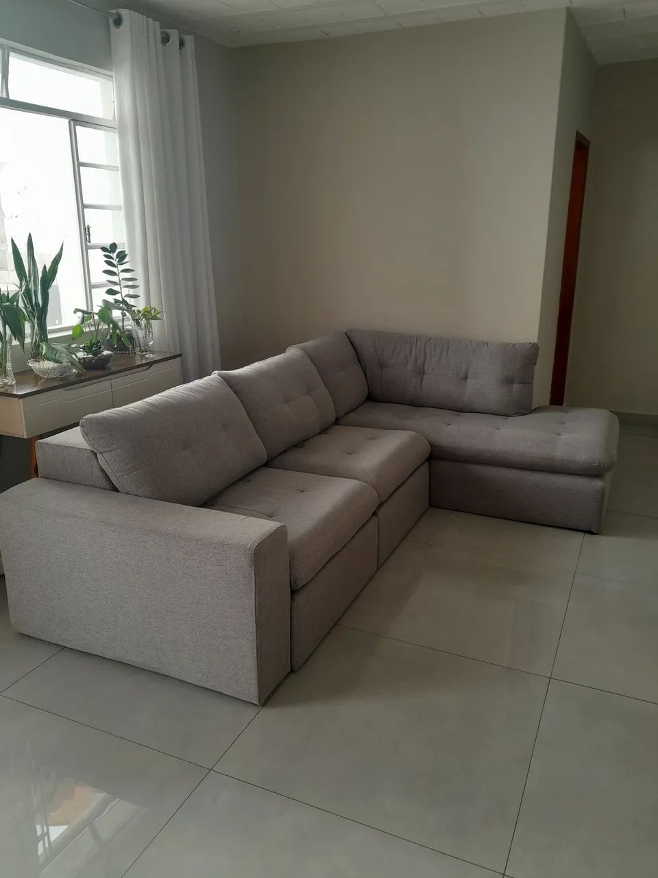 Sofa retratil de linho cinza
