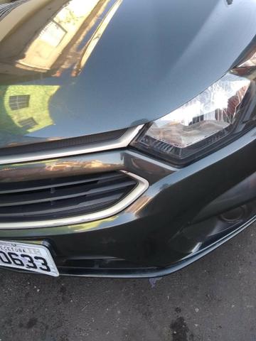 Onix lt 1.0 completo ja 6 macha 2016/17 passando financiamento - Foto 5