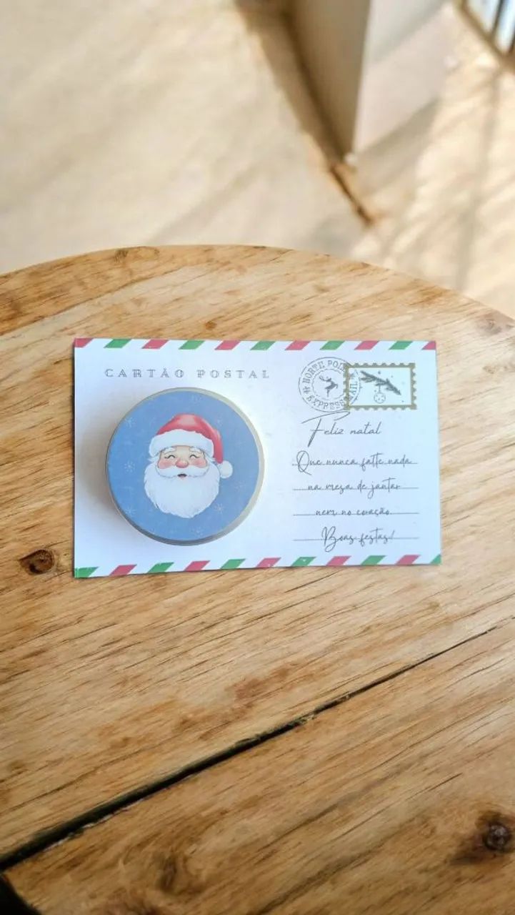 Cartão postal natalino com vela aromática 