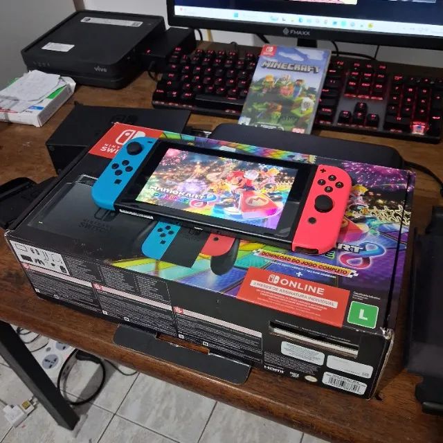 Nintendo Switch V2 completo + 1 jogo - Foto 2