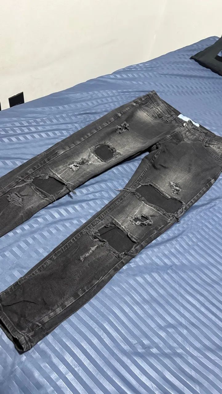calça jeans jogador