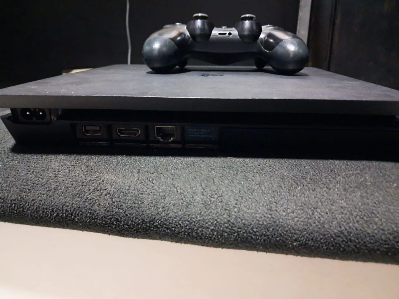 VENDO PS4 SLIM COM 2 JOGOS E 1 CONTROLE E COM TODOS OS CABOS - Foto 3
