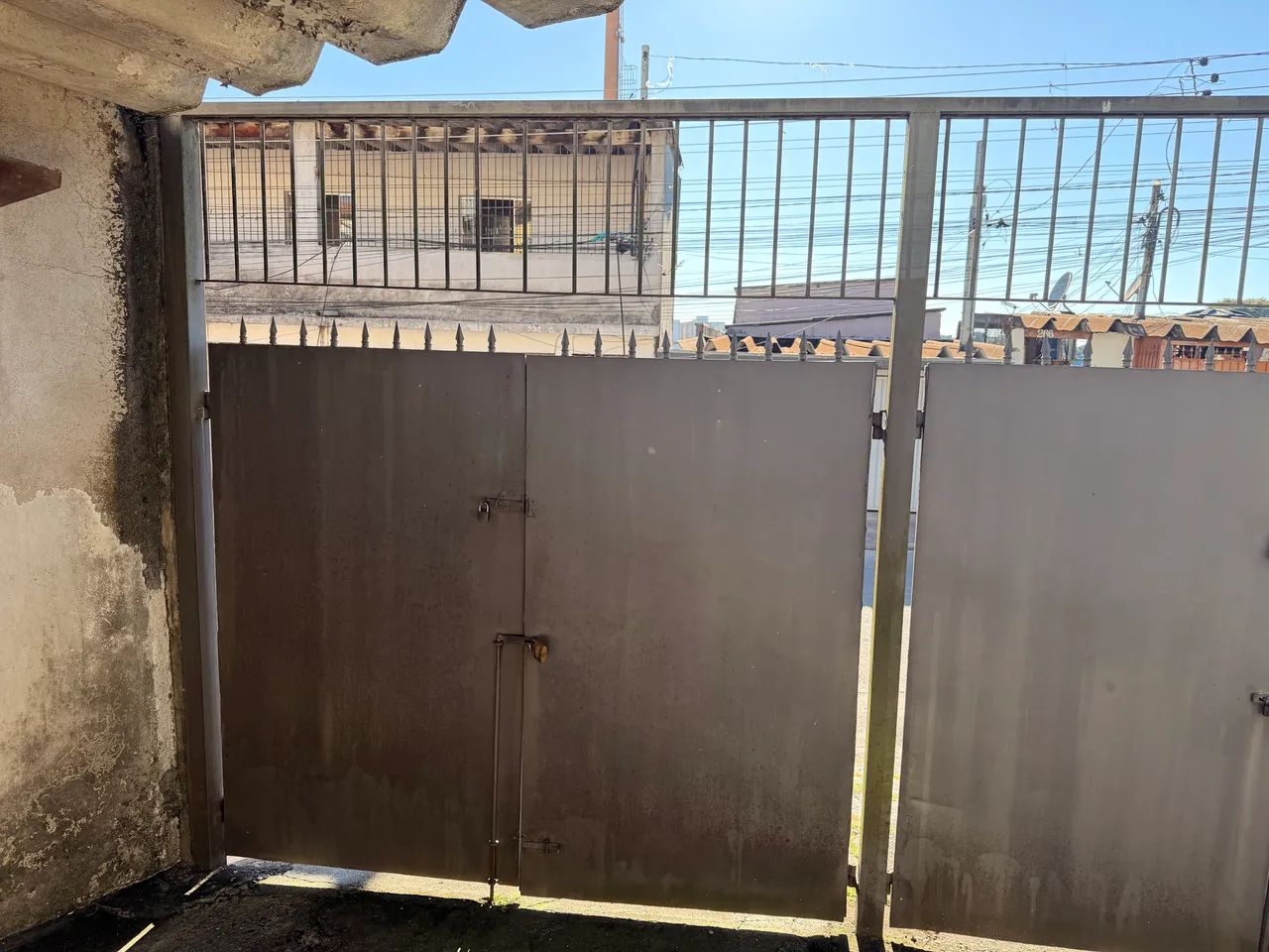Vendo portão triplo de ferro usado