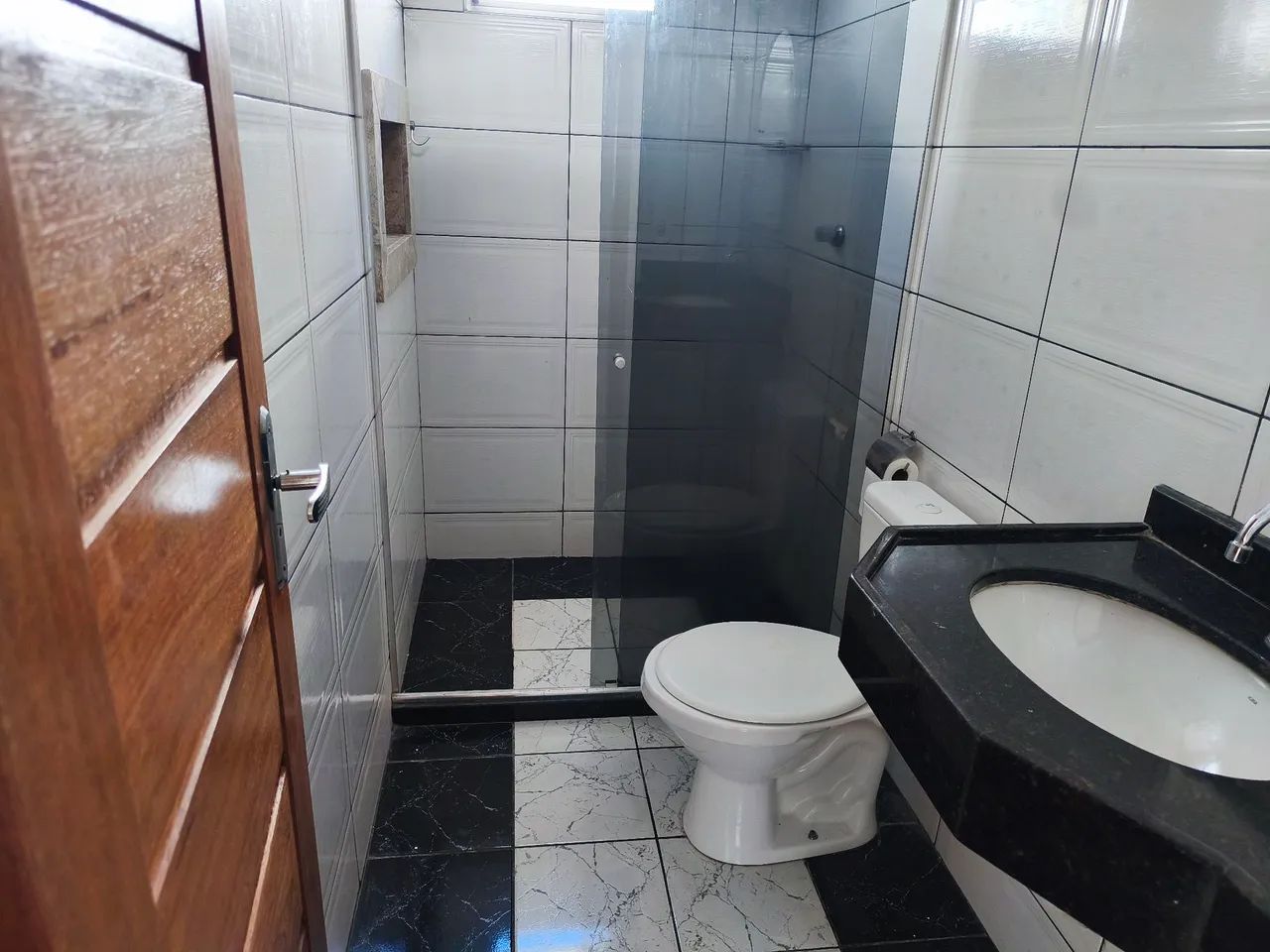 Casa 2Q térrea garagem coberta Av. serra dourada 
