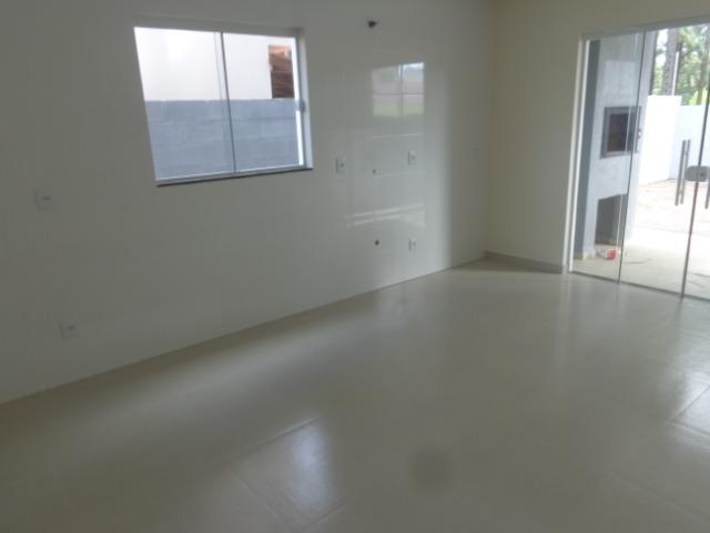 Lindo sobrado 3 quartos,1 suite, ótima localização escritura publica - Foto 11