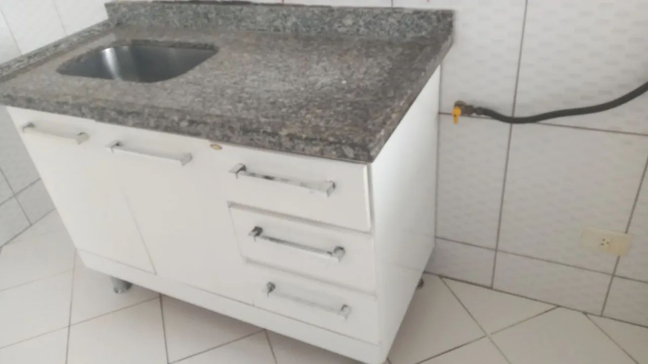 Cuba de cozinha em granito com armário