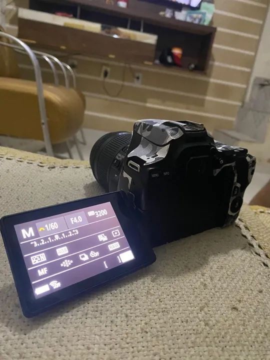 Camera canon sl3 ótimo estado 