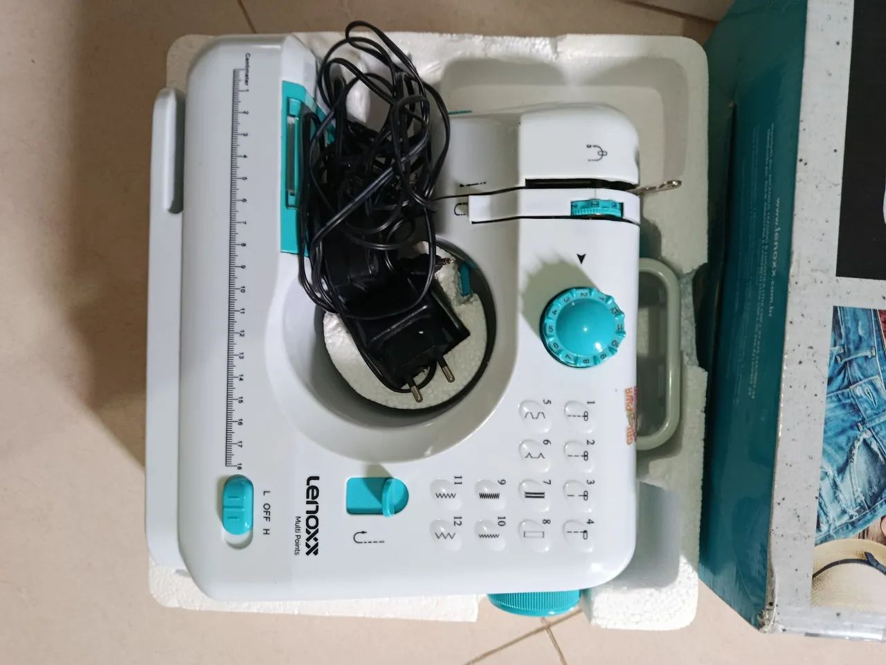 Máquina costura multi point