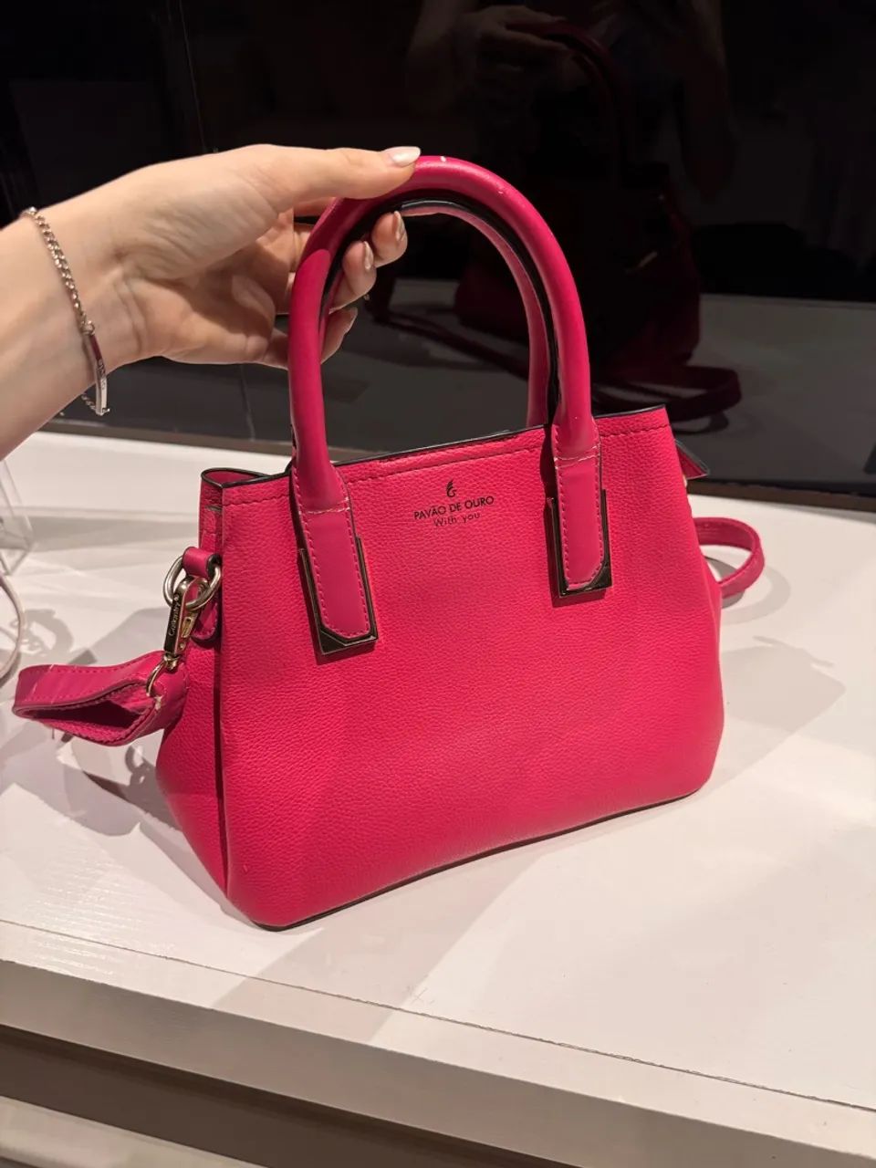 Bolsa rosa pavão de couro 