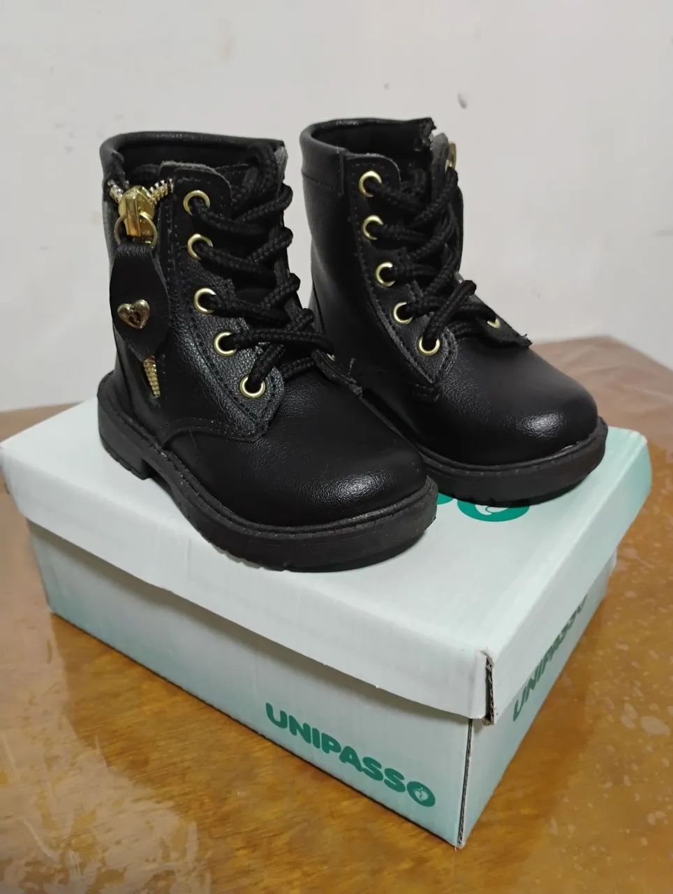 Botas infantis pretas da Unipasso