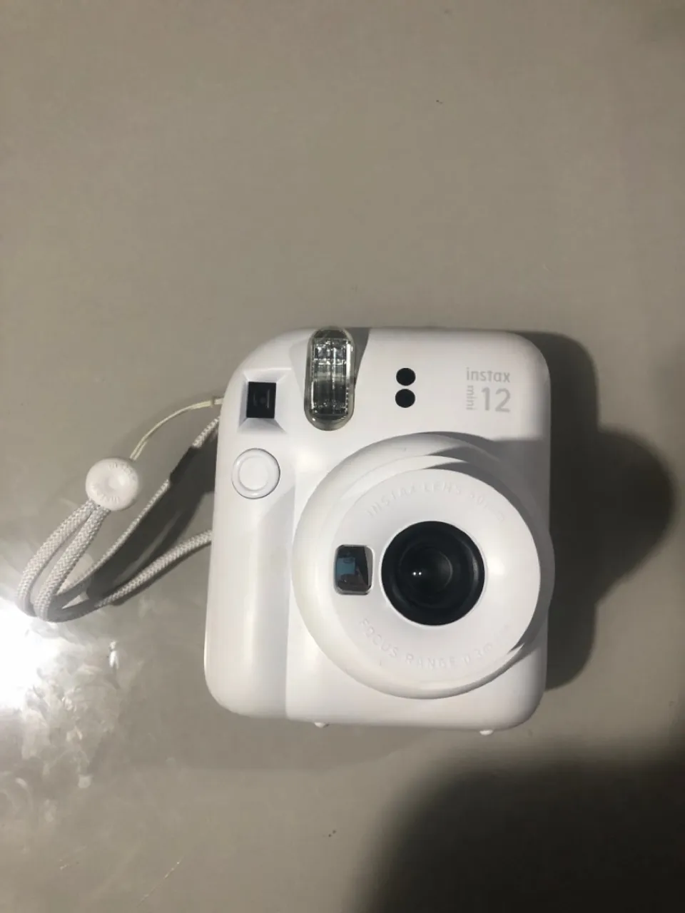 Câmera Instax Mini 12 - Fotos instantâneas