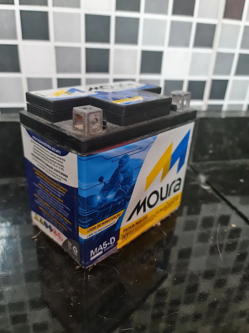 Bateria Moura 5ah pra motos partida elétrica 