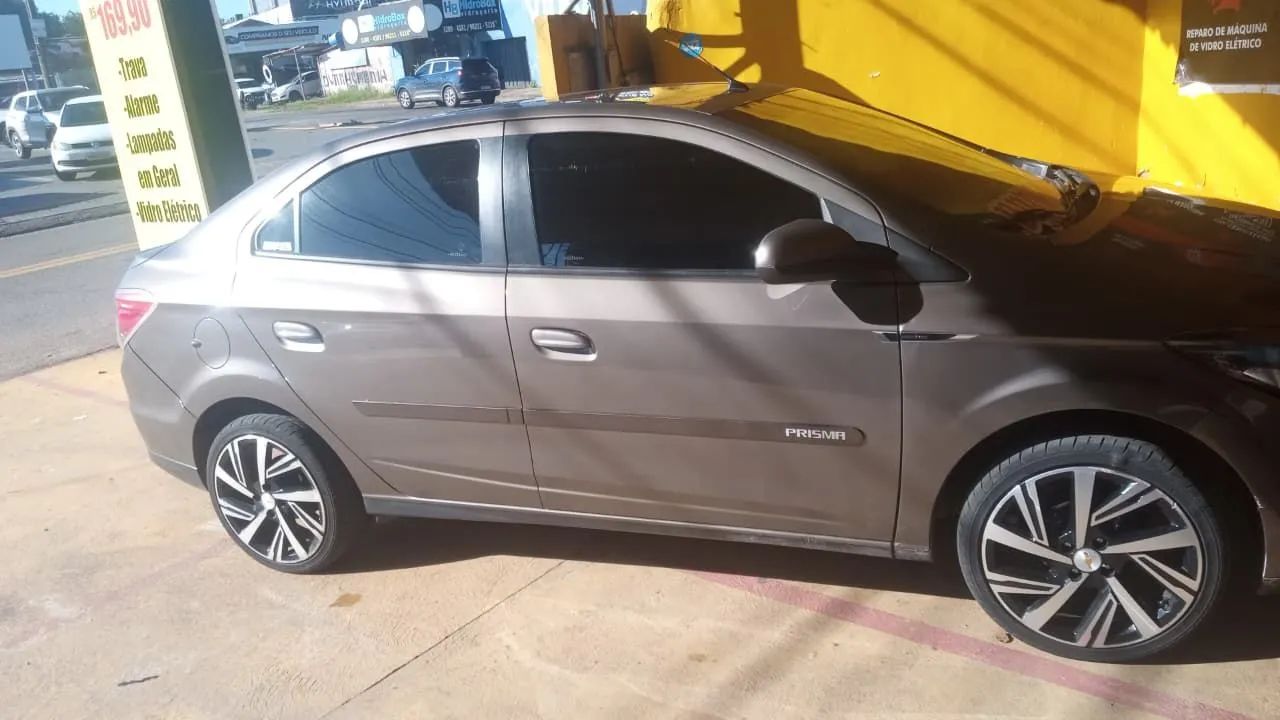 Prisma 2013/14 1.4 LTZ cinza metálico completo faço 37.000 à vista leia o anúncio - Foto 2