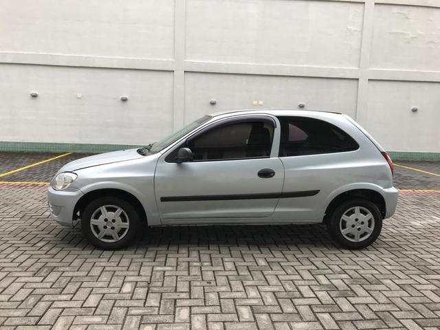Chevrolet Celta com Ar-condicionado - Entrada + 390 por mês - Foto 8