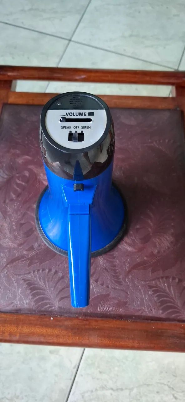 Battery-powered megaphone. Batteries not included.64617707776769121
