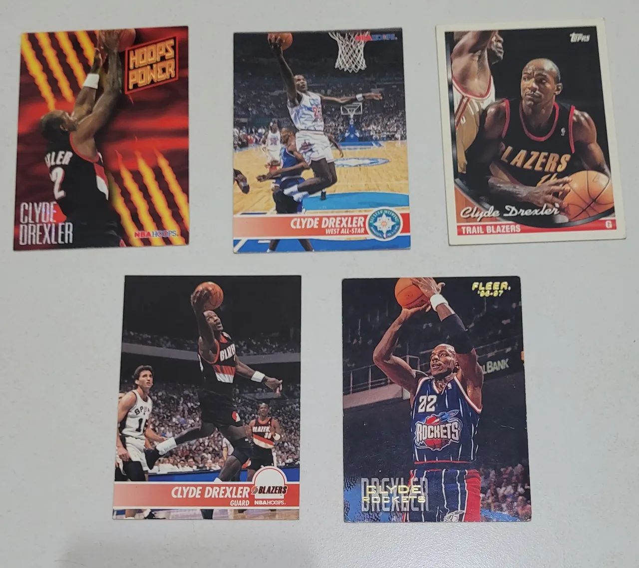 LOTE COM 5 Cards NBA Clyde Drexler - All Star, Portando Trail Blazers, Houston Rockets
