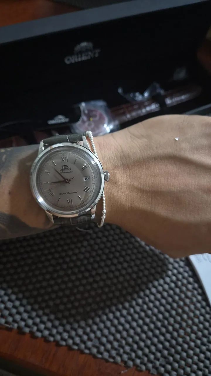 Orient bambino bege e vermelho 1999 cada - Foto 4