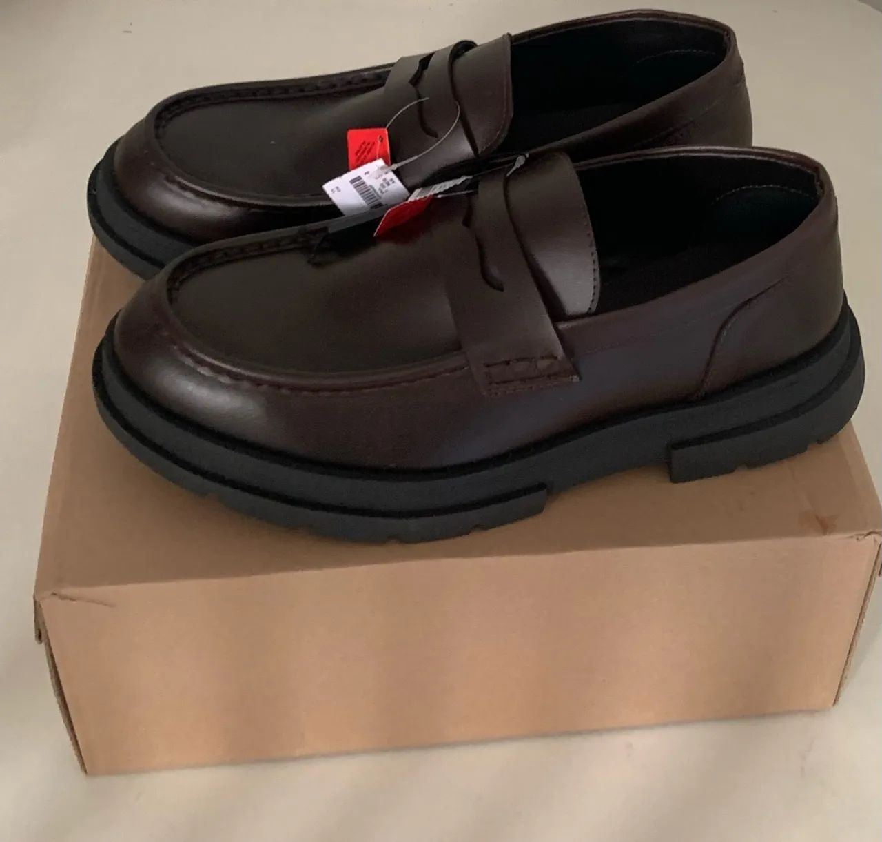 Sapato mocassim com sola tratorada 