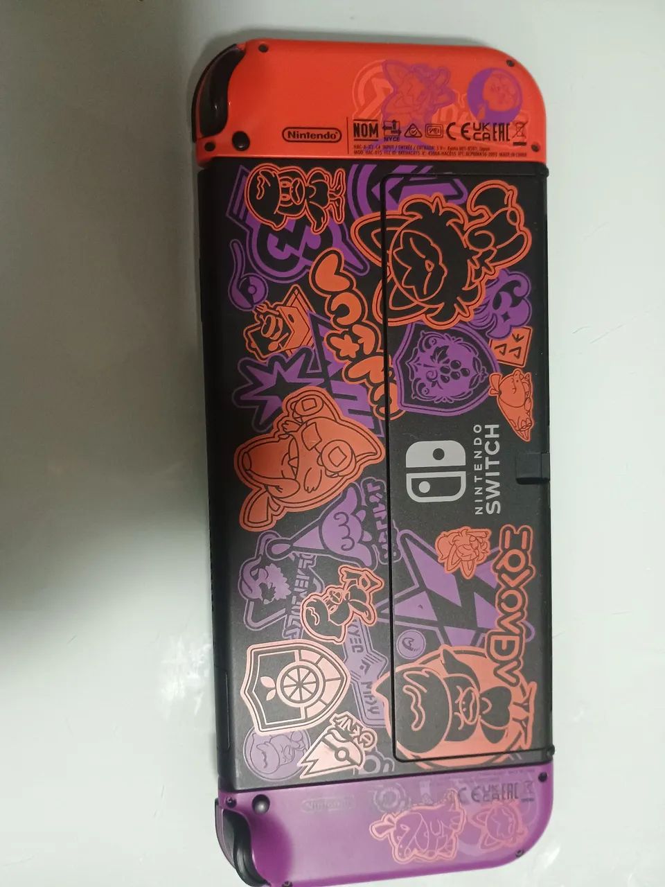 NINTENDO SWITCH OLED SCARLET VIOLET - Foto 2